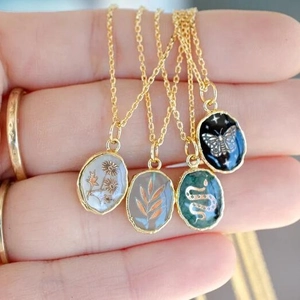 Four sets of vintage gold stainless steel necklaces with nature-inspired stone pendants