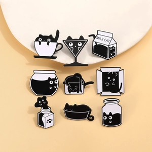 Set of nine cute black and white cartoon cat enamel pins in various container designs