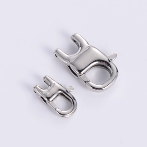 Macro shot of mirror-polished silver stainless steel lobster clasps in two sizes