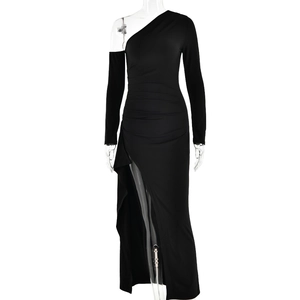 Elegant black one-shoulder long sleeve dress with high slit and ruched detail