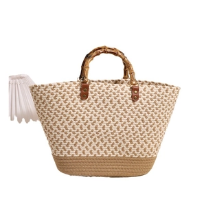 Large capacity cotton woven straw tote bag with bamboo handles on a clean white background