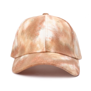 Metallic tie-dye baseball cap with glitter marble pattern in brown and peach colors
