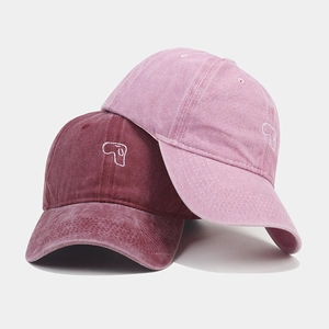Vintage washed canvas baseball caps in burgundy and pink with cute puppy embroidery