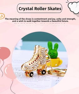 Macro shot of rhinestone-encrusted roller skate keychain with gold alloy lobster clasp