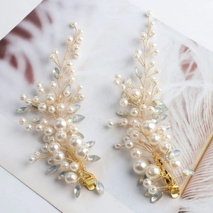 Handmade bridal hair clips with pearls and crystal leaves on elegant gold wire