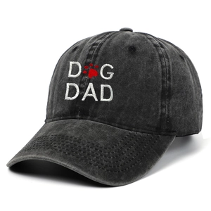 Vintage washed black baseball cap with white DOG DAD embroidery and red paw print