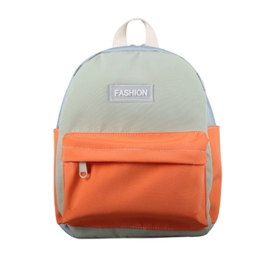 Minimalist canvas backpack for kids with green and orange color-block design
