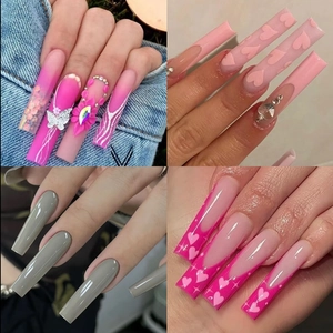 Four styles of long pointed press-on nails including floral pink and matte heart designs