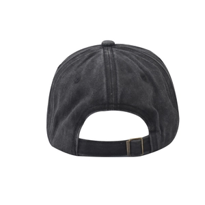 Detail of adjustable metal buckle and vintage washed denim fabric on baseball cap