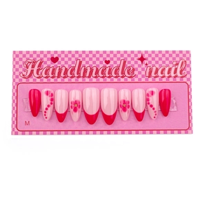 Pink and red press-on nails set with floral hand-painted designs and heart patterns