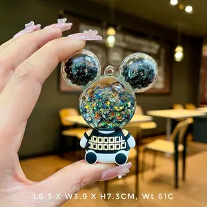 Detailed view of Mickey-shaped keychain with colorful sequins and dimensions shown