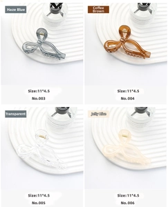 Detail view of elegant bow-shaped hair claws in four jelly colors, size 11x4.5 cm