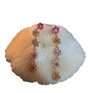 Boucles d'oreilles longues à pompon fleuri avec pendentifs de fleurs multicolores