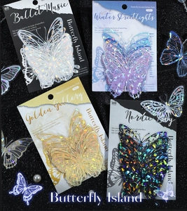 Macro detail of iridescent laser hollow-out butterfly stickers for scrapbooking and DIY