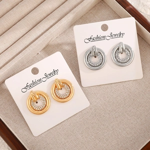 Minimalist hollow round stud earrings with sparkling pave rhinestones in gold and silver