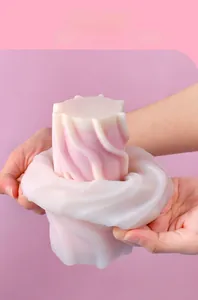 Flexible silicone mold for DIY wave pillar candles showing easy demolding process