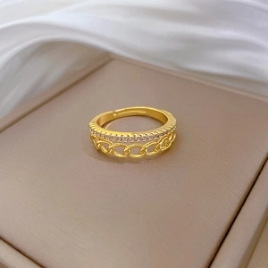 Macro shot of double-layer gold plated chain ring with micro-set zircon stones