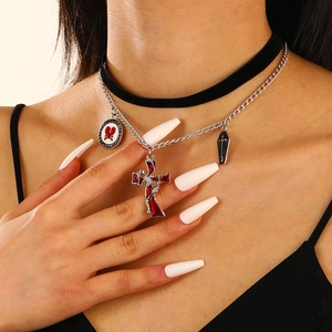 Gothic layered choker featuring skull heart pendant and red cross coffin charms for women