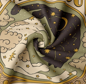 Detail of tapestry showing woven fabric texture and celestial cat illustration design