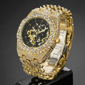 Luxurious gold iced-out mechanical watch for men featuring a hollow skeleton dial