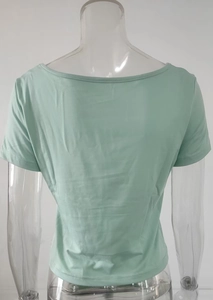 Detailed back view of mint green slim fit short sleeve t-shirt on a clear mannequin