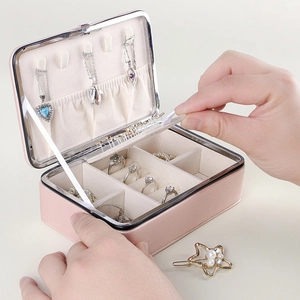 Portable pink PU leather jewelry box with necklace hooks and multi-functional slots