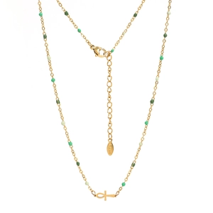 Close-up of golden Ankh necklace featuring green enamel beads and lobster clasp detail