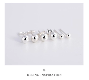 Macro detail of various sizes S999 sterling silver ball stud earrings set