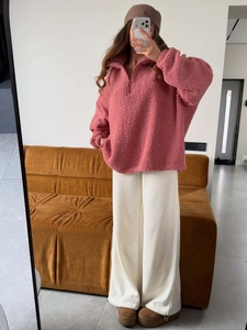 Women's pink sherpa fleece sweatshirt with half-zip and warm loose-fit long sleeves