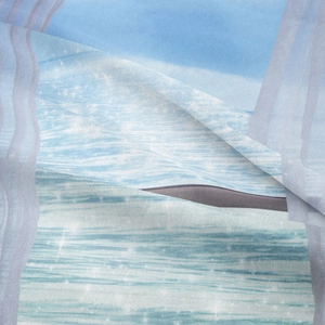 Detailed view of the ocean wave tapestry fabric with sparkling pearlescent glitter effect