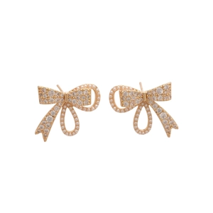 Elegant gold plated bow earrings with zircon stones and pearls on white background