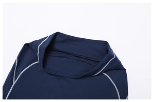 Detail of high-waisted navy sports shorts with white contrast stitching and round collar neck