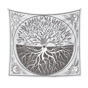 Close-up of bohemian tree of life tapestry with sun and moon celestial graphics