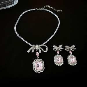 Parure bijoux nœud argenté avec collier et boucles d'oreilles cristal rose chic