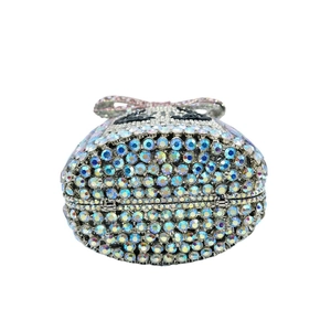 Macro bottom view of luxury crystal champagne bottle clutch bag with iridescent rhinestones