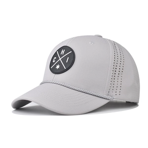 Light grey baseball cap with laser-cut ventilation holes and round logo patch