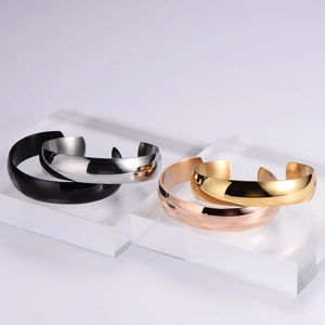 Polished Mobius cuff bracelets in black, silver, rose gold and gold finishes