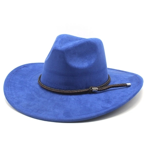 Detail of royal blue suede fedora featuring a brown braided leather band and silver buckle