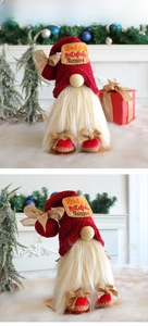 Detail of Christmas gnome with red knit hat and thankful grateful blessed embroidery