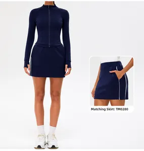 Detail view of the functional pocket and reinforced stitching on the athletic mini skirt