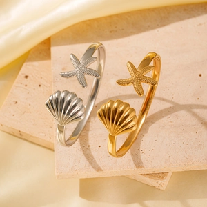 Fashionable gold and silver stainless steel open bracelets with starfish and shell design