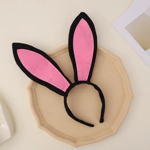 Cute pink and black plush rabbit ear headband for Easter party or cosplay costumes