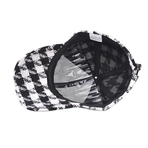 Thickened black and white houndstooth plaid baseball cap with polyester fabric and inner support