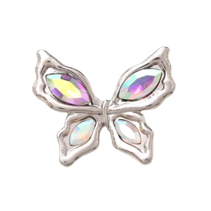 Silver bow-shaped shoe charm with sparkling rhinestones on a clean white background