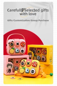 Close-up of kids DIY silicone bag kit with cartoon charms and gift box packaging