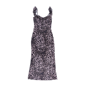 Detail of leopard print dress featuring ruffled V-neckline and adjustable tie strings