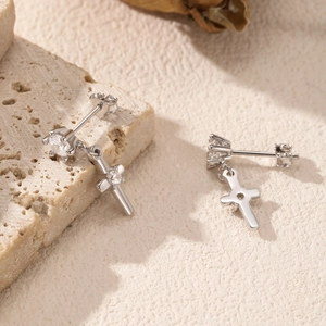 S925 sterling silver cross earrings with shimmering zircon pendant on natural stone base