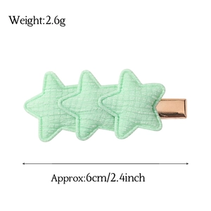Star-shaped fabric hair clip in light green with rose gold metal base and dimensions