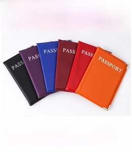 Detail showing colorful PU leather passport covers with protective metal corners in six colors