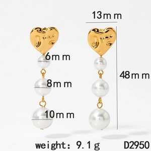 Detail showing gold heart-shaped metal pieces and three tiered white pearls with dimensions